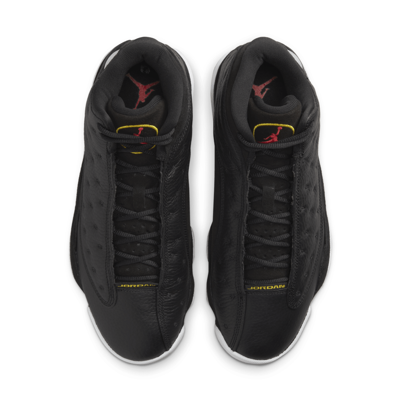Black yellow jordan 13 hotsell
